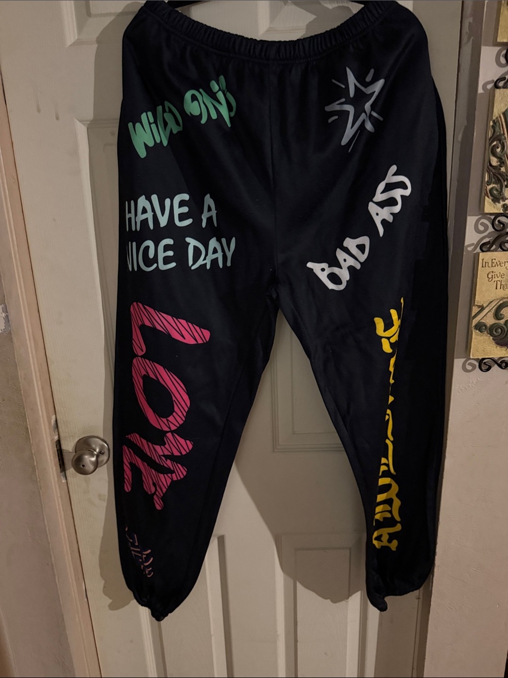 Black Graphic Jogger Sweatpants with Colorful Slogan Prints